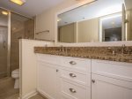 Beautifully Renovated Master Bathroom with Double Vanity and Walk in Shower at 1757 Bluff Villa
